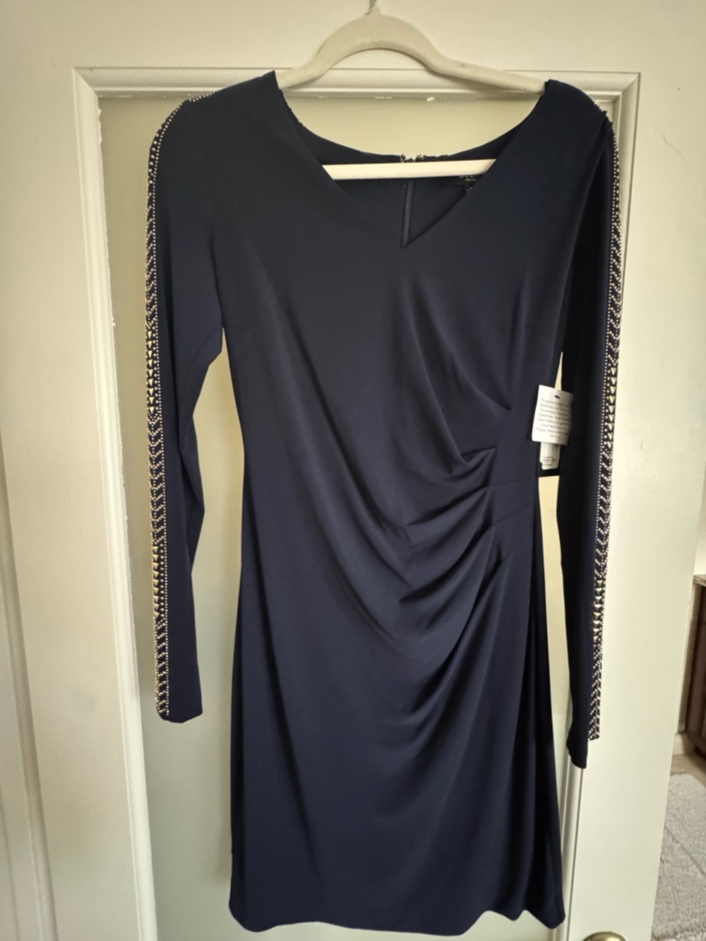 Guess Navy Garment with Gold Accents on the Sleeves